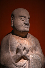 Wall Mural - Close-up of stone sculptures of Buddha statues in ancient Chinese Buddhist temples