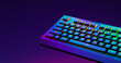 Rainbow keyboard, close-up. Black Gaming keyboard with RGB light. Backlit keyboard in a dark room, 3d render