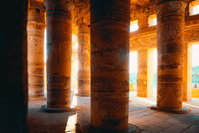 Aligned Shot Of Ancient Egyptian Pillars In Karnak Temple In Luxor, Ancient Temple Open To Public. Remains Of The Great Egyptian Civilization