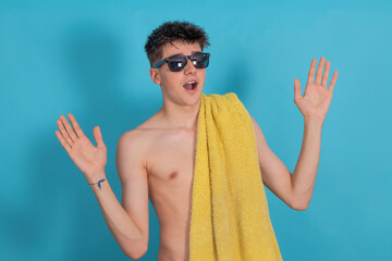 Poster - amazed teenage girl with towel sunglasses and swimsuit isolated with space