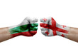 Two hands punch to each others on white background. Country flags painted fists, conflict crisis concept between bulgaria and georgia