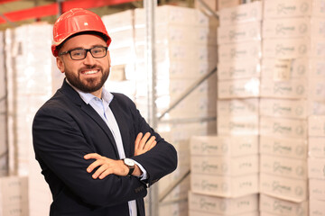 Poster - Manager in hardhat at warehouse. Logistic center