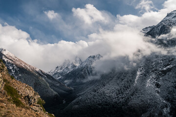 Wall Mural - The Caucasus mountains in Russia. Beautiful landscape. Nature and cloudy mountain background.