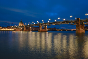 Wall Mural - Garonne river and Dome of the 'Hopital de la Grave' at dusk in Toulouse, France