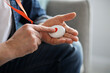 © Prostock-studio - Man pushing panic button on emergency equipment for elderly people
