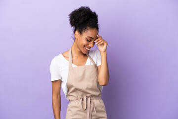 Sticker - Restaurant waiter latin woman isolated on purple background laughing