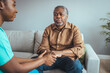 © Dragana Gordic - Nurse holding hand of senior man in rest home. Doctor helping old patient with Alzheimer's disease. Shot of a caregiver helping a senior man. Care Worker Helping Senior Man