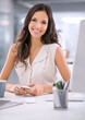 © Yuri Arcurs/peopleimages.com - Shes made it. Shot of an attractive businesswoman sitting at her desk in an office.