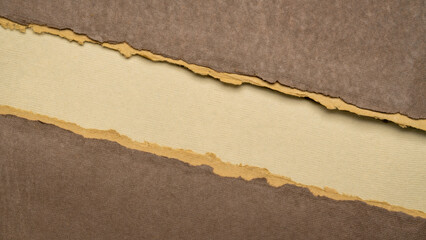 paper abstract in earth tones with a copy space - sheets of handmade paper, diagonal blank web banner