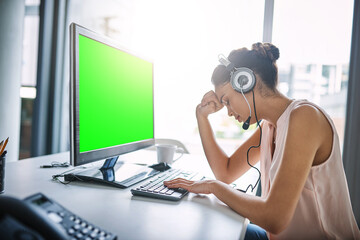 Poster - Sometimes helping people is difficult. Cropped shot of an attractive young woman looking stressed while working in a call center.