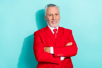 Sticker - Photo of cheerful man pensioner dressed red three piece tux arms crossed isolated teal color background