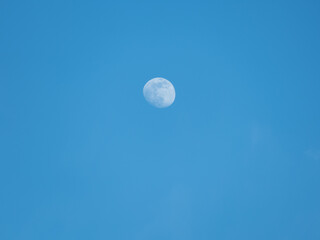 Sticker - The Moon setting into the clouds in daytime