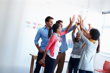 Poster - Theres no better work than teamwork. Shot of a group of casually dressed businesspeople in the office.