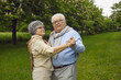 © Studio Romantic - Happy loving mature senior couple dancing in park enjoy weekend time together outdoors. Romantic caucasian grandparent in love having fun relax in forest. Healthcare lifestyle retirement concept
