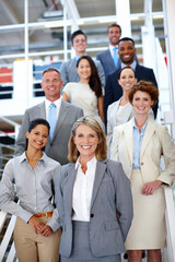 Poster - she leads the way. portrait of a diverse group of businesspeople in the office.
