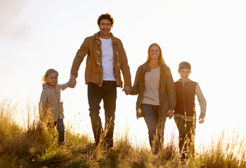 Sticker - Family is everything. Portrait of a happy family out on a morning walk together.