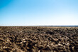 Empty and plowed fields, preparation for next harvest. Agriculture, soil before sowing.  Gardening or ecology concept.