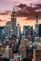 Fototapete - Aerial view of New York City midtown skyline at sunset along 5th Avenue