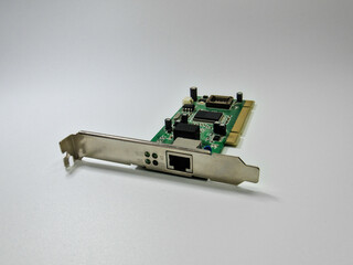 Ethernet network adapter computer card standing isolated on the white backgroud, copy space