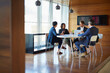 © Cecilie Skjold Wackerhausen/peopleimages.com - Big things are done in the boardroom. Shot of a group of corporate businesspeople working in the boardroom.