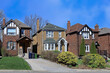 © Spiroview Inc. - Residential street with older two story brick detached houses in spring