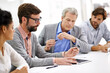 © Yuri Arcurs/peopleimages.com - Hard working office pros. Shot of a group of young professionals working at a desk in an office.