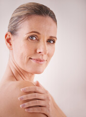 Wall Mural - Beauty with age. Studio shot of a mature woman with beautiful skin.