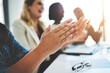 © Delmaine D/peopleimages.com - Keeping workers happy helps strengthen a company in many ways. Cropped shot of a group of businesspeople applauding a business presentation.
