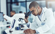 © Thurstan H/peopleimages.com - Always question, always wonder. Cropped shot of a young male scientist working in his lab.