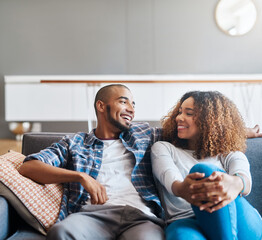 Aufkleber - Im never too busy for my bae. Shot of a happy young couple relaxing together on the sofa at home.