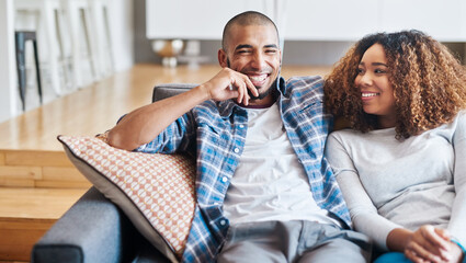 Aufkleber - Theres no substitute for spending time. Portrait of a happy young couple relaxing together on the sofa at home.