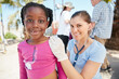 © Daniel Laflor/peopleimages.com - Feeling great thanks to doctor. Shot of a volunteer nurse examining a young patient with a stethoscope at a charity event.