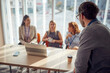 © luckybusiness - A young businessman is enjoying in a coffe break with his female colleagues in a commission during an interview for a new job position. Business, people, company