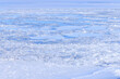 冬の凍結した山中湖に浮かぶ氷の模様