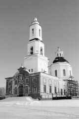 Wall Mural - Christian church in a snowy field