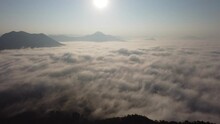 4K Sea Fog And Golden Sunrise Covers The Area On The Top Of Hill Doi Phu Thok, Chiang Khan, Loei, Thailand With Background Of Sunrise On Winter. 