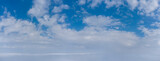 Fototapeta  - Panorama of blue sky with white clouds