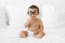 Cute Baby With Goggles And Smart Expression