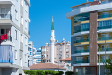ALANYA, TURKEY - MAY 26, 2021. White Minaret With A Green Spire