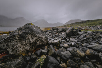 Wall Mural - Wet rocks in rainy mountainous terrain