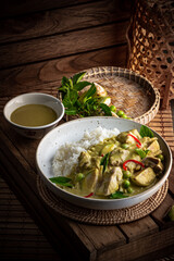 green curry with chicken topping on rice