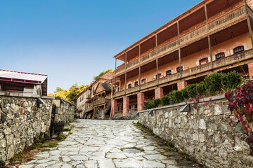 Street Sharambeyan in the town of Dilijan with ancient traditional stone houses. Republic of Armenia