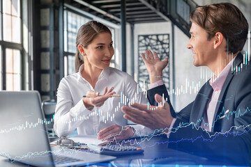 Wall Mural - Businessman and businesswoman in formal wear working together to optimize trading strategy at corporate finance fund. Forex chart hologram over office background with panoramic windows