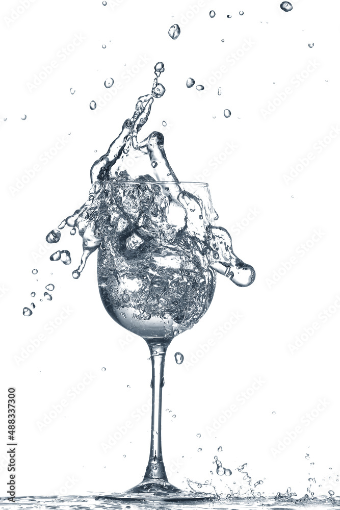 Glass of clean water with splash on white background