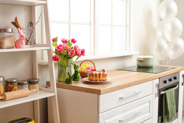 Sticker - Easter cake, basket of eggs and tulips on kitchen counter