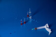 © diczman - Syringe and medicines lie on blue background