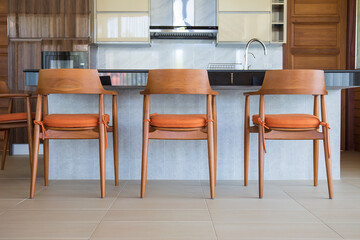 Corner of cooking room and wooden furniture.