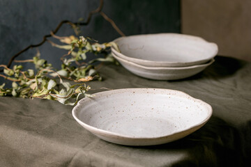 Set of empty craft ceramic speckled bowls