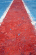 red and blue painted grungy corroded surface background