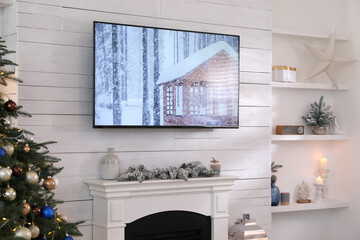 Canvas Print - Stylish living room interior with modern TV and Christmas tree